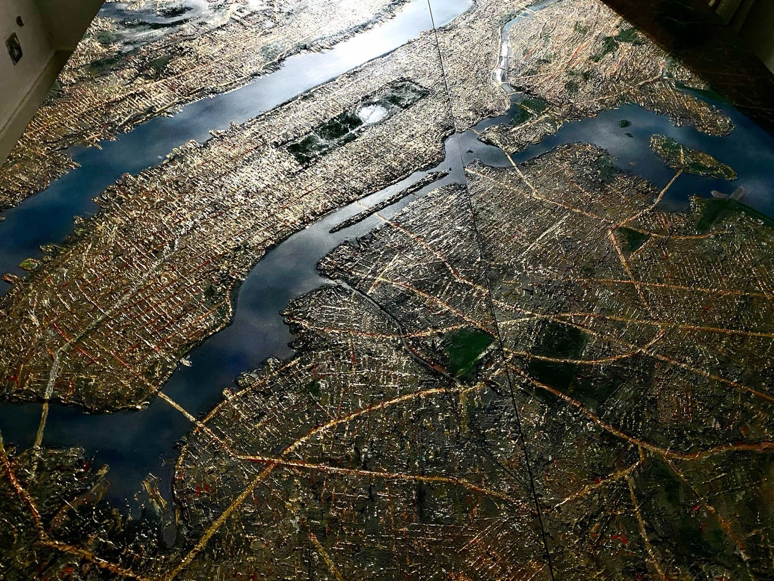 Gold leaf and sculptural detail across the New York waterways