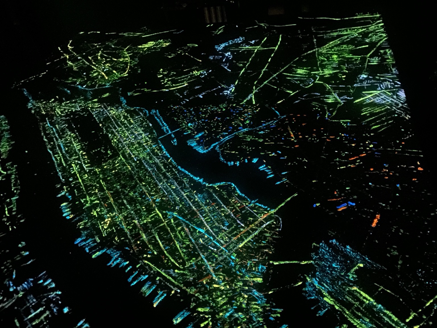 Precious metal city details illuminated in green